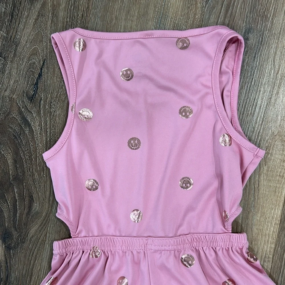 Body glove romper smiley face pink with gold smiles. Size 7 Sleeveless